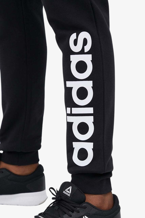 Pantaloni Essentials Tapered Cuff Logo-adidas performance-Nero-Uomo-Ic0063-