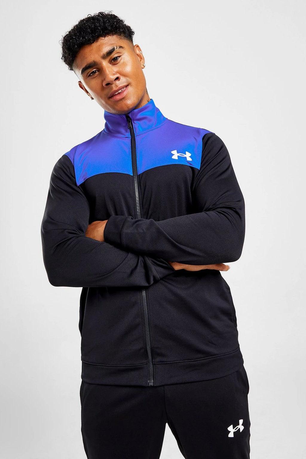 Under armour tuta store nera e oro