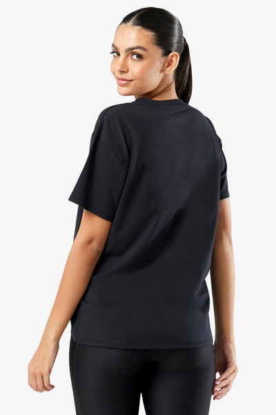 under armour T-Shirt Maniche Corte Essential Cotton Stretch Nero Donna, foto 4
